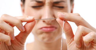 Enfiler une aiguille