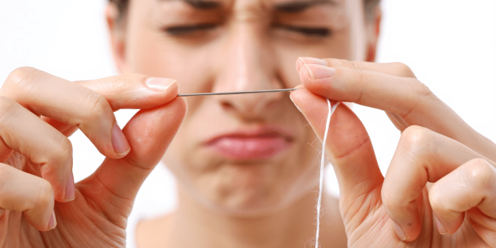 Enfiler une aiguille